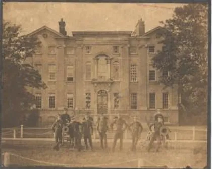 Cadets standing in front of the Academy