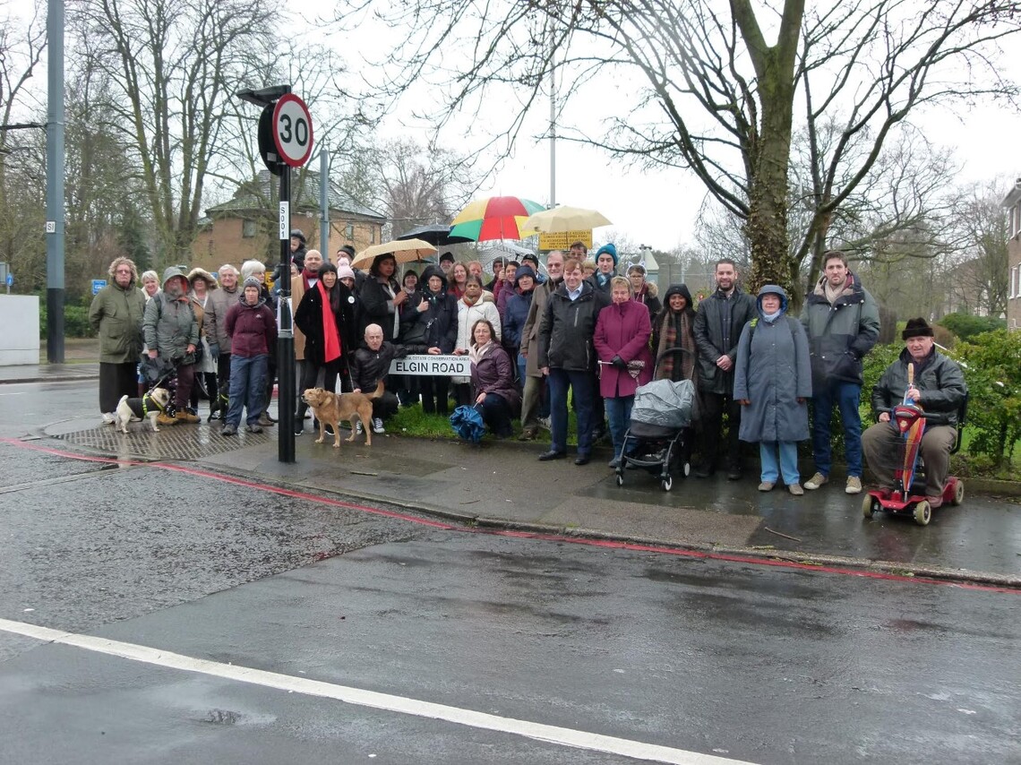 Large group of residents at the bottom of Elgin road